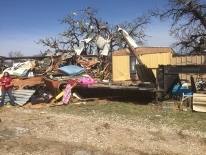 High winds from the Tolar storm blew one mobile home on top of the other.