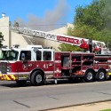 Fire Fighters Battling Large Apartment Fire